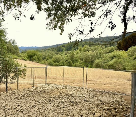 A new Bear Creek Road parking lot is now under construction parking lot