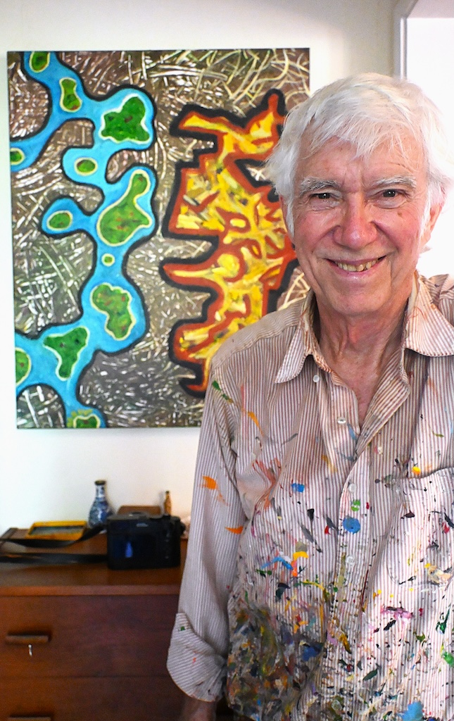 Rudy Rucker in front of his painting
