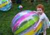 Hitmen, Summit Sisters entertain at ‘Endless Summer’ fundraiser big beach ball and child
