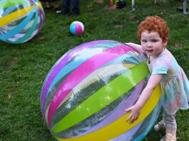 Hitmen, Summit Sisters entertain at ‘Endless Summer’ fundraiser big beach ball and child