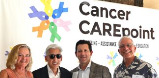 in front of the Cancer CAREpoint banner
