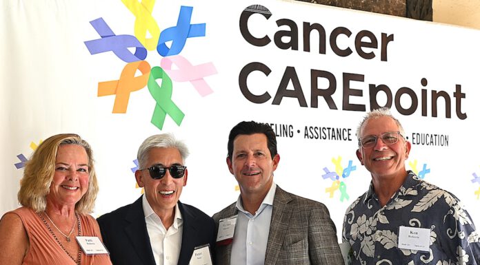 in front of the Cancer CAREpoint banner
