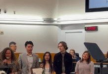 being recognized at a ceremony