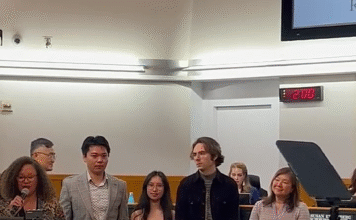 being recognized at a ceremony