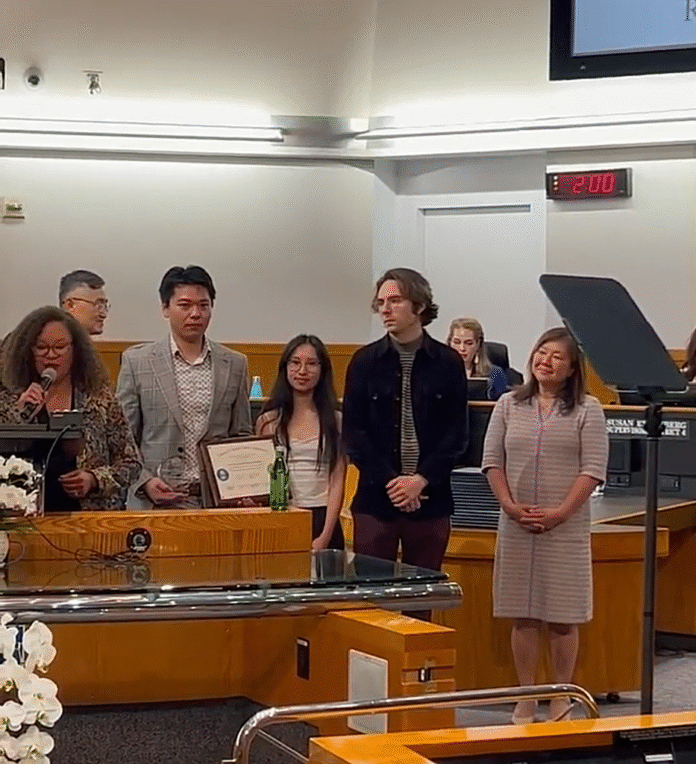 being recognized at a ceremony