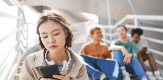Asian student looking somewhat despondent
