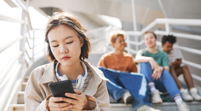 Asian student looking somewhat despondent