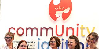 art show opening at NUMU including person in wheelchair