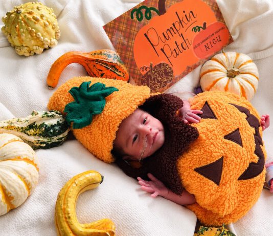 baby in neonatal unit was dressed up as a pumpkin