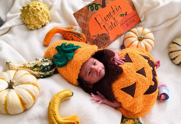 baby in neonatal unit was dressed up as a pumpkin