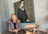 Shannon Hunt-Scott in front of Bader Ginsburg painting
