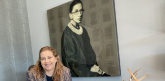 Shannon Hunt-Scott in front of Bader Ginsburg painting