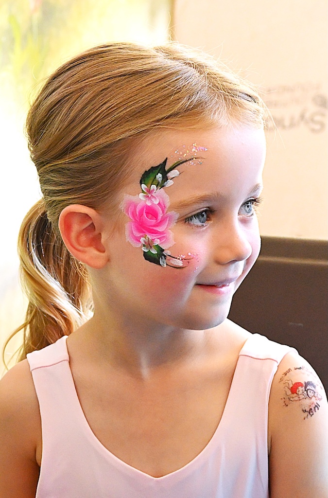 Winnie with painted rose rose face paint